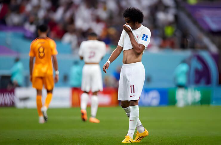 Akram Afif dan timnas Qatar merasakan pengalaman pahit di Piala Dunia 2022.