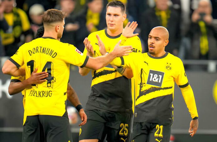 Kolaborasi Niclas Fuellkrug dan Donyell Malen membawa Dortmund menangi spieltag ke-21 Liga Jerman.